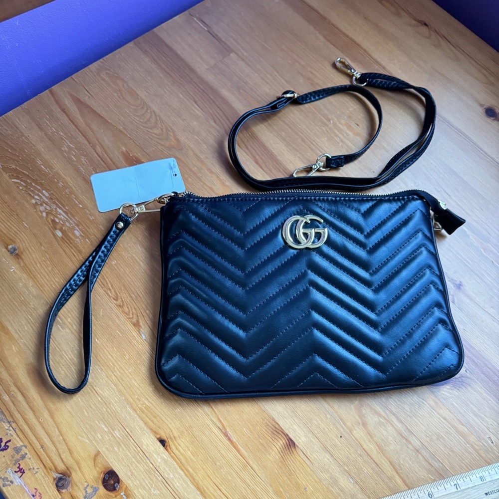 Black quilted crossbody/wristlet